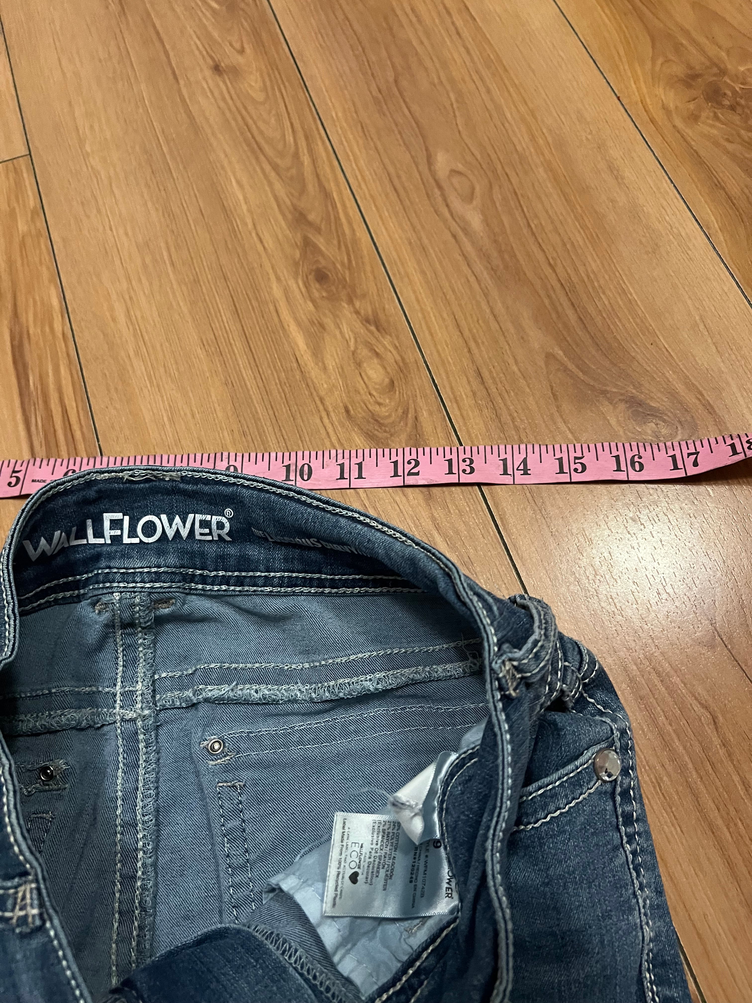 Embroidered low rise flare jeans with contrast size 8