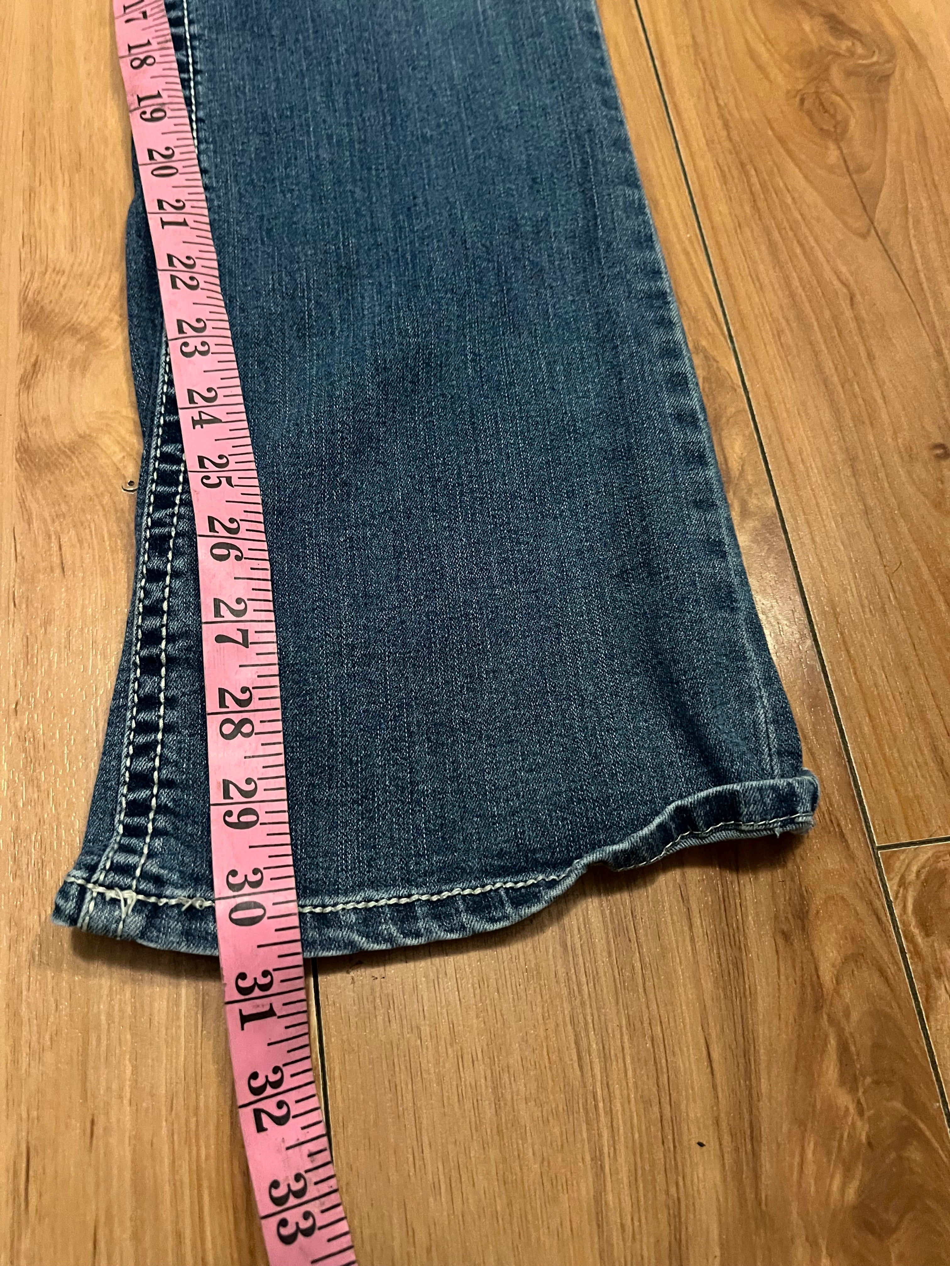 Embroidered low rise flare jeans with contrast size 8
