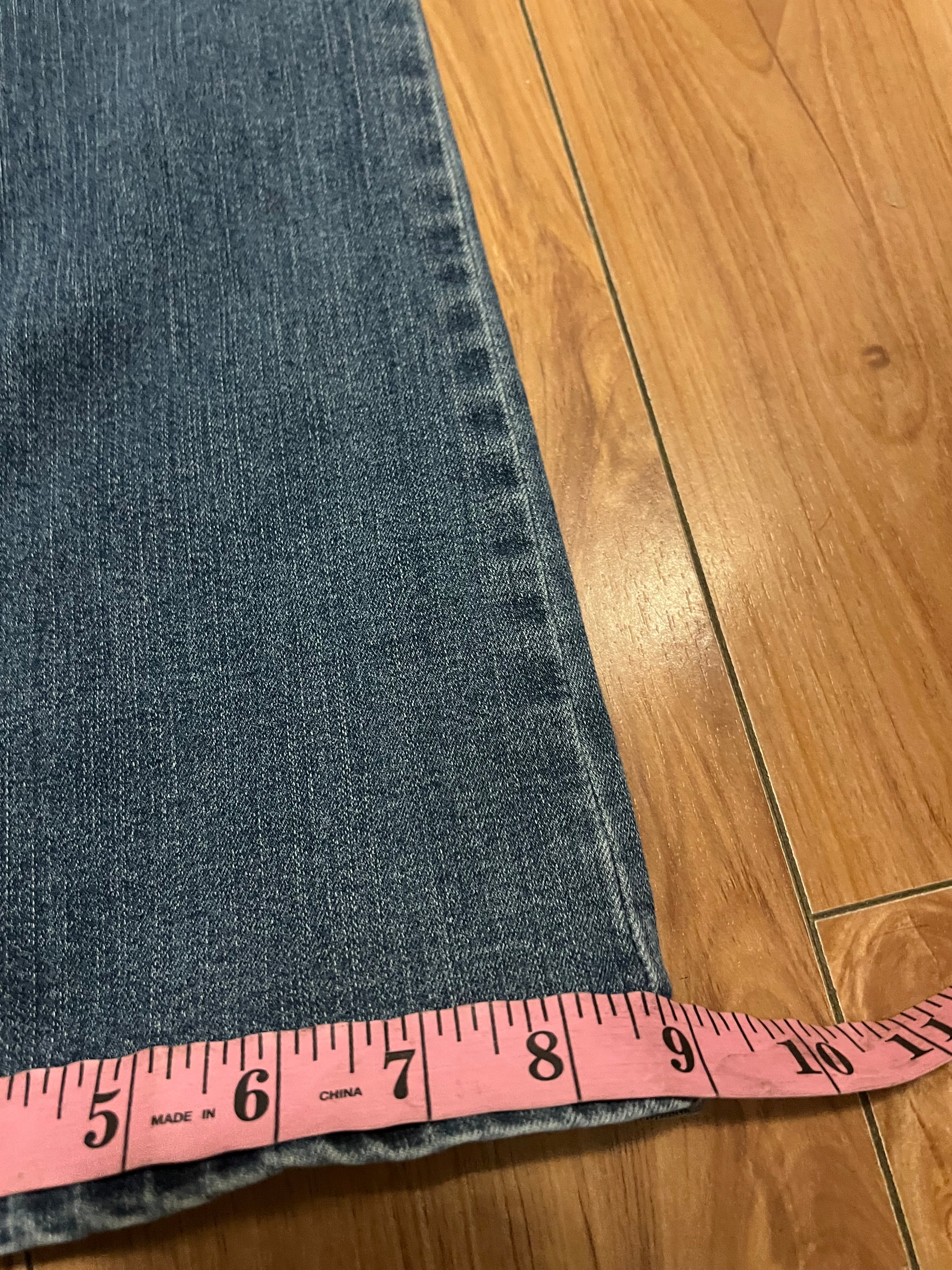 Embroidered low rise flare jeans with contrast size 8