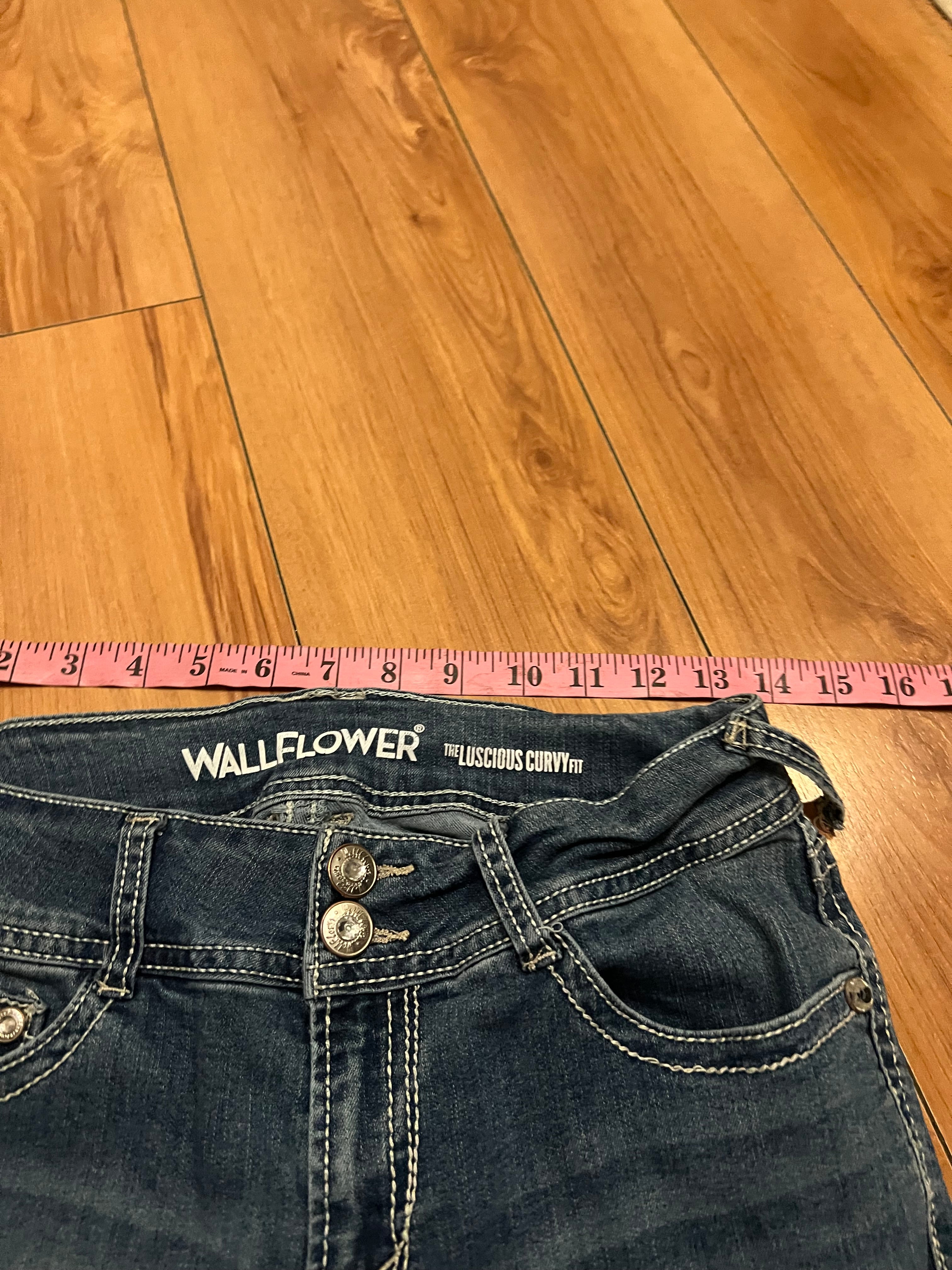 Embroidered low rise flare jeans with contrast size 8