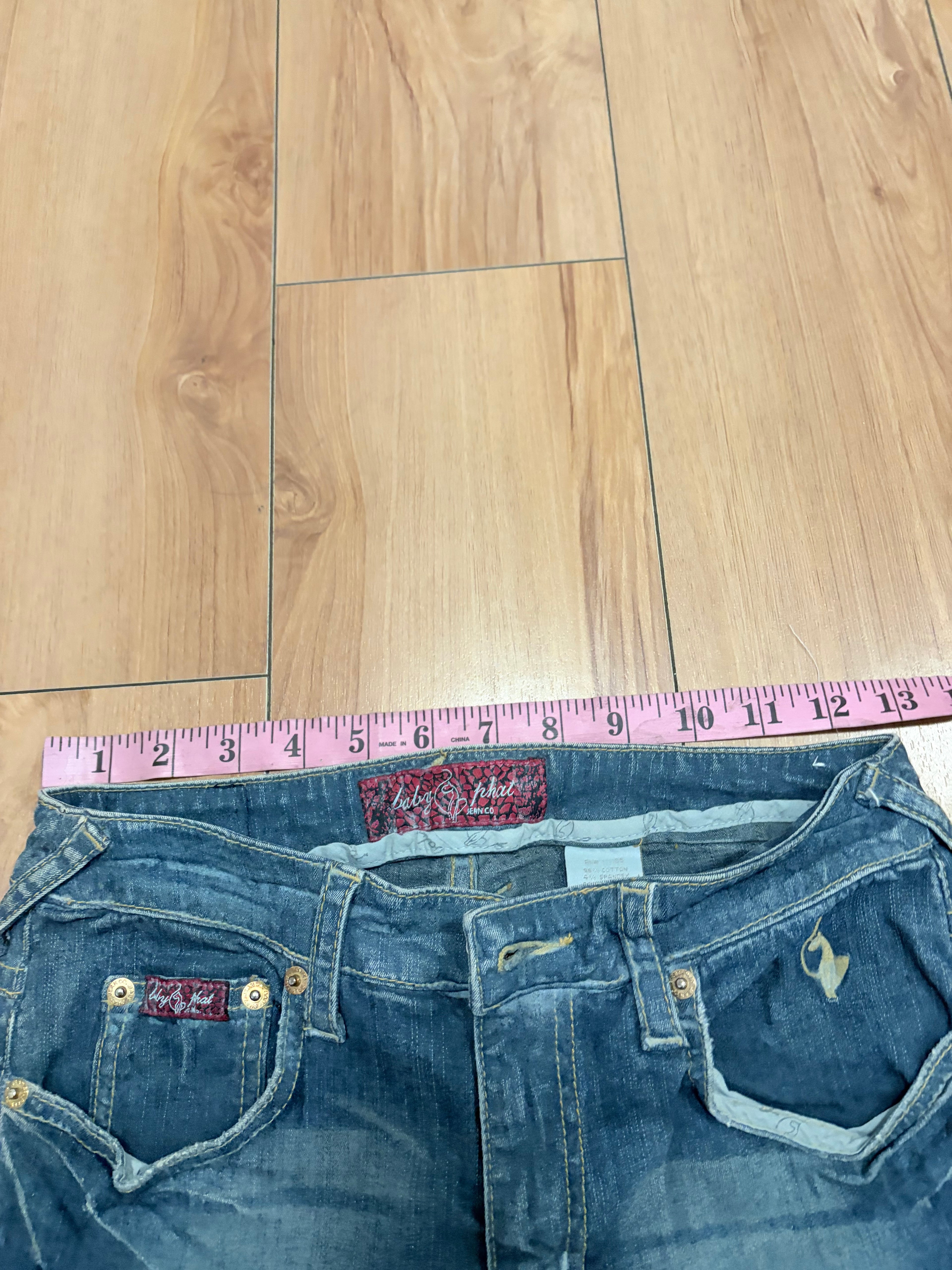 Baby phat low rise denim jeans with acid wash size 4