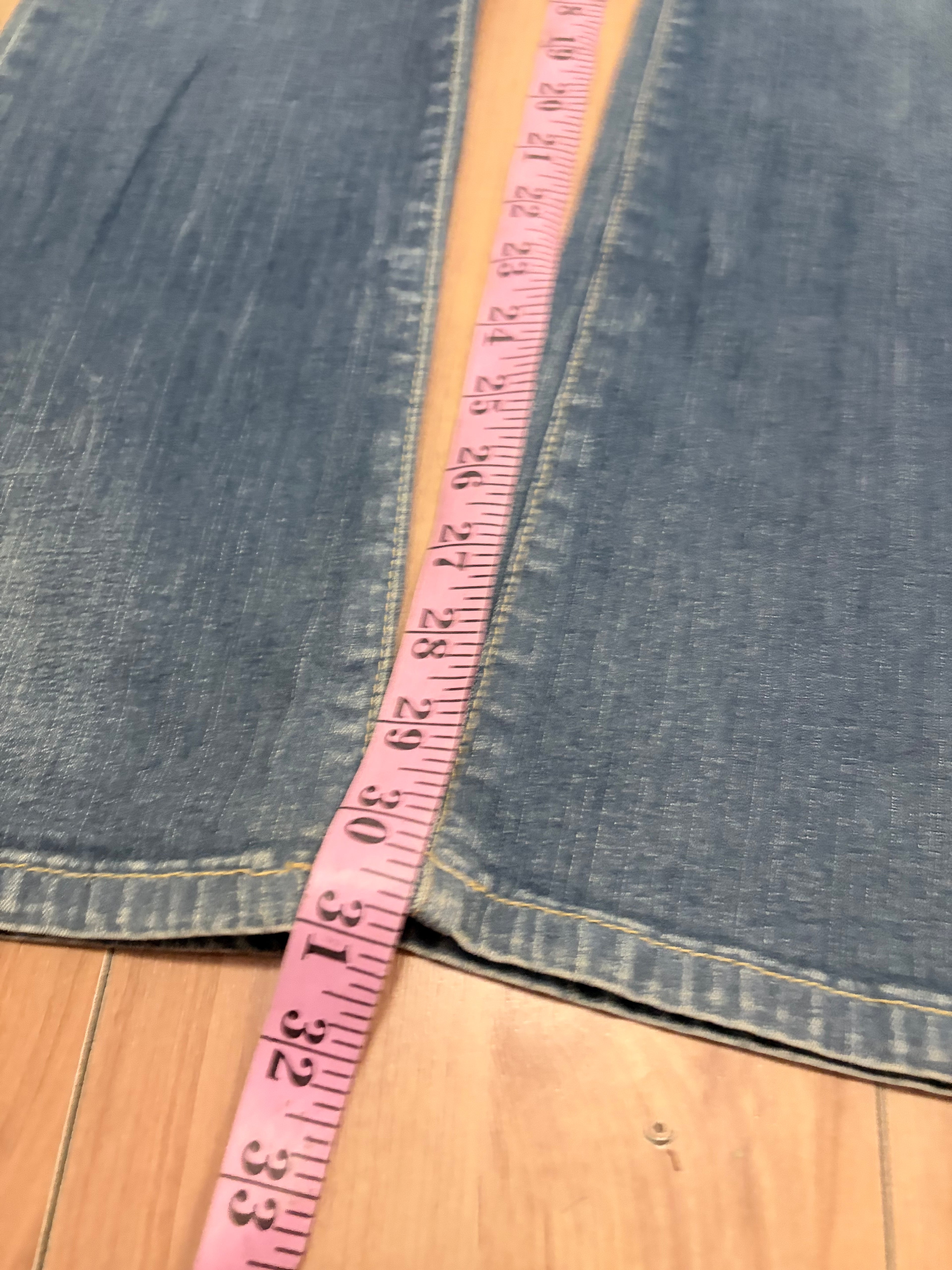 Baby phat low rise denim jeans with acid wash size 4
