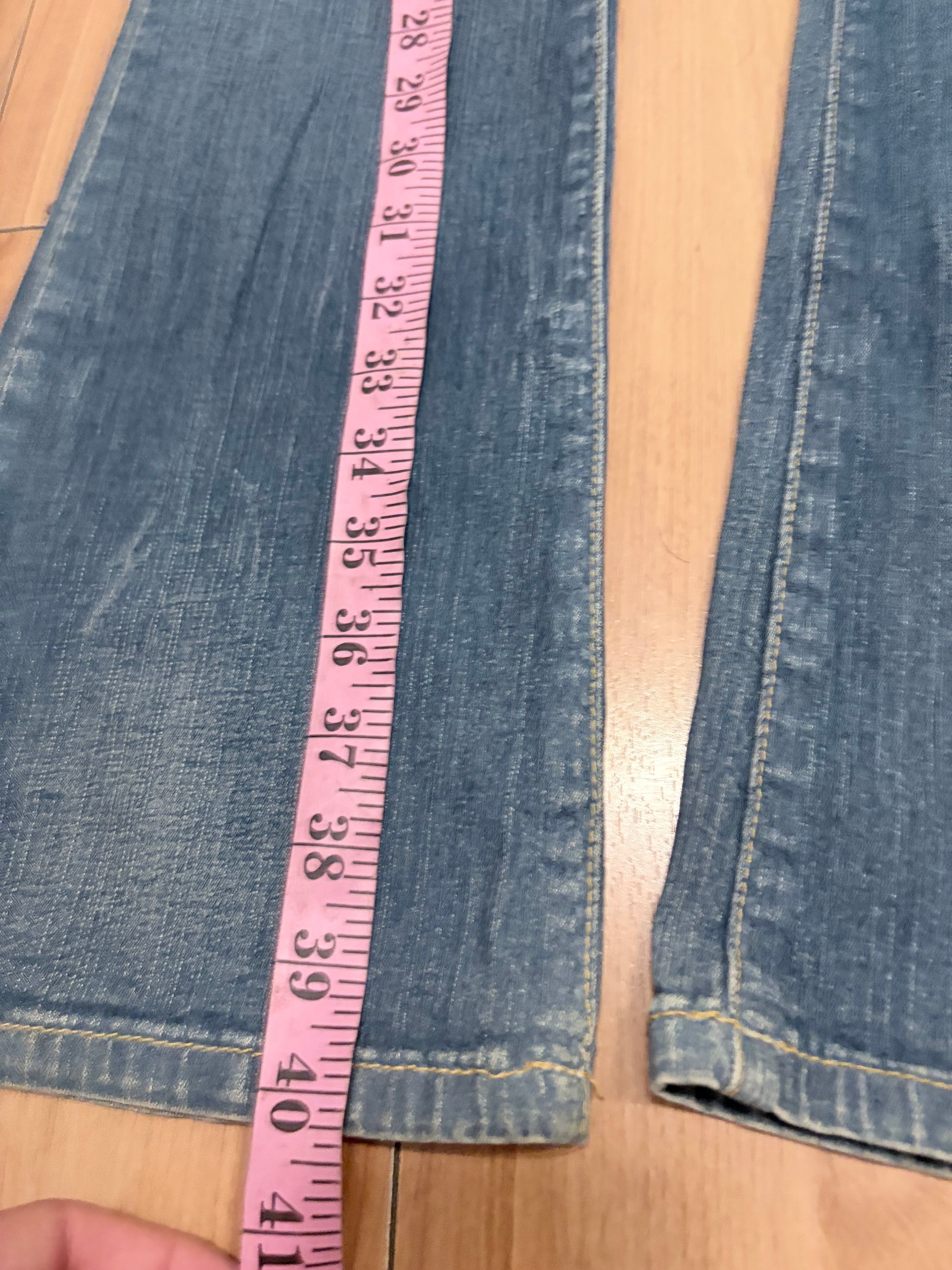 Baby phat low rise denim jeans with acid wash size 4